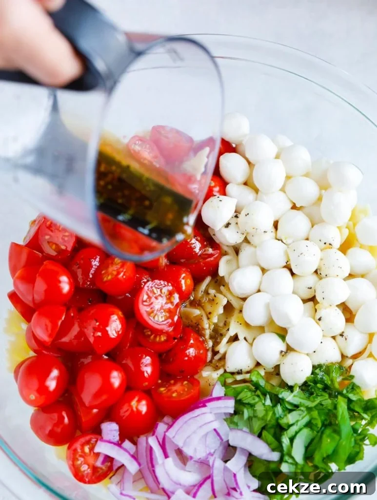 Caprese Pasta Salad with Cherry Tomatoes, Mozzarella & Basil 3 Caprese Pasta Salad