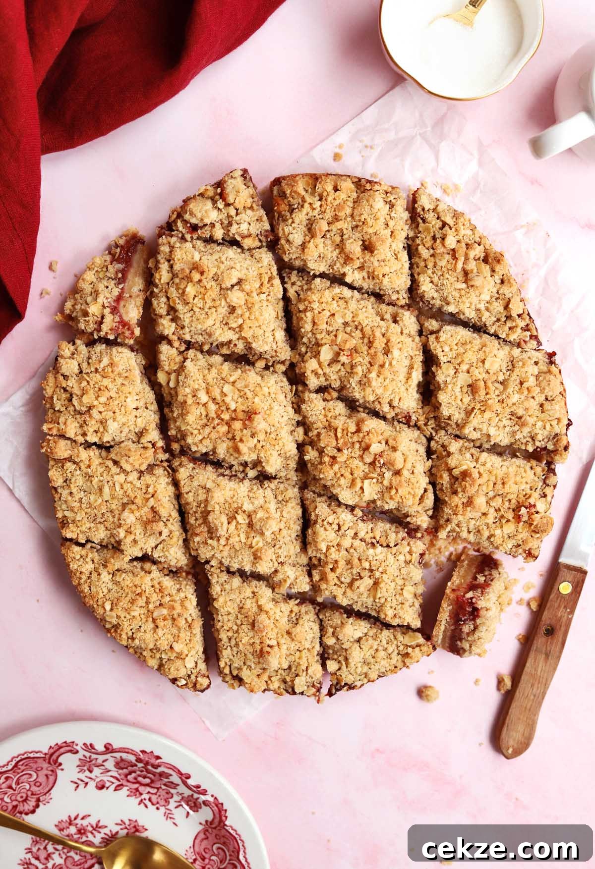 strawberry crisp bars sliced into diamonds on parchment