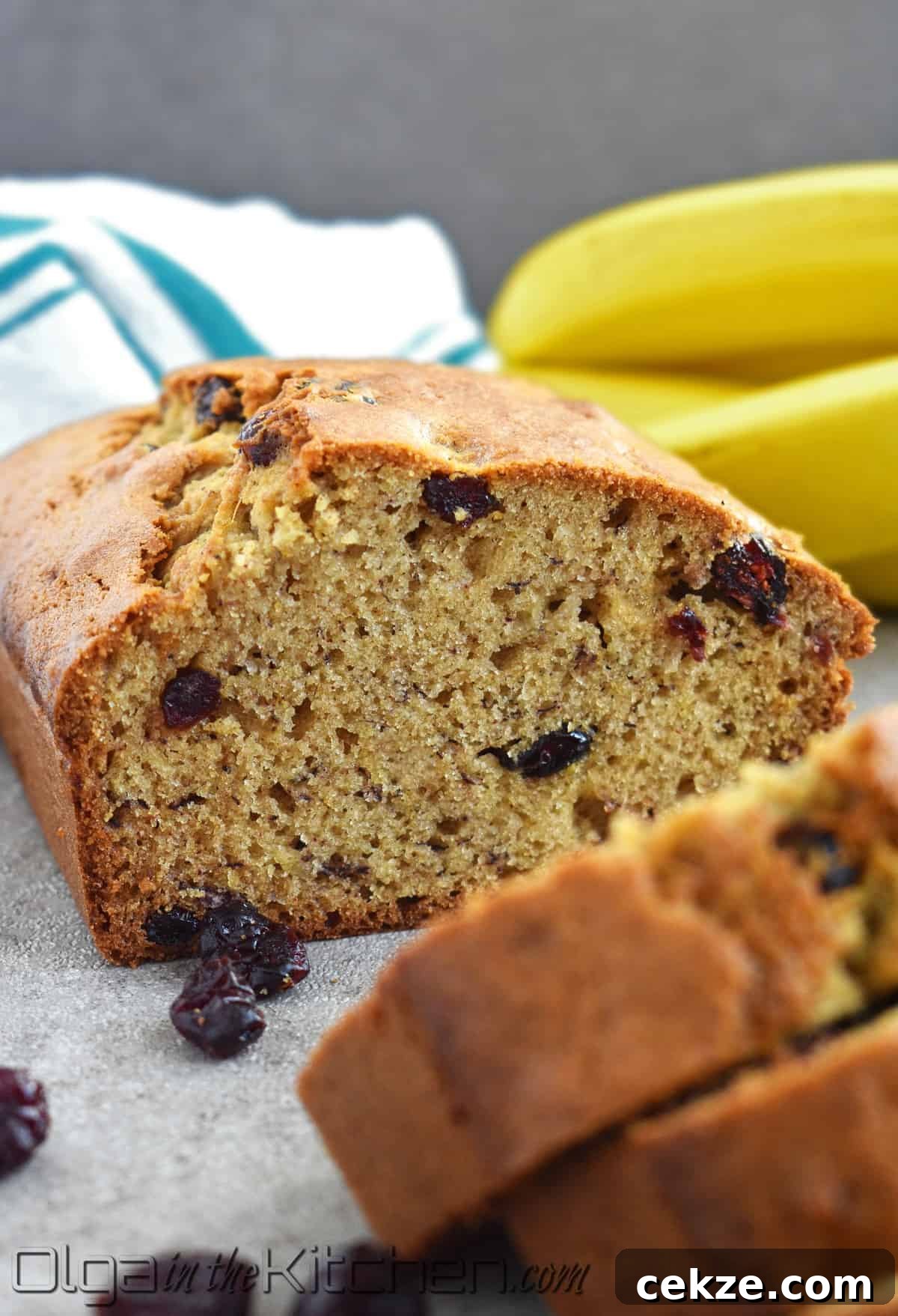 Cranberry Banana Bread is perfectly moist, slightly sweet and loaded with sweet tangy cranberries.
