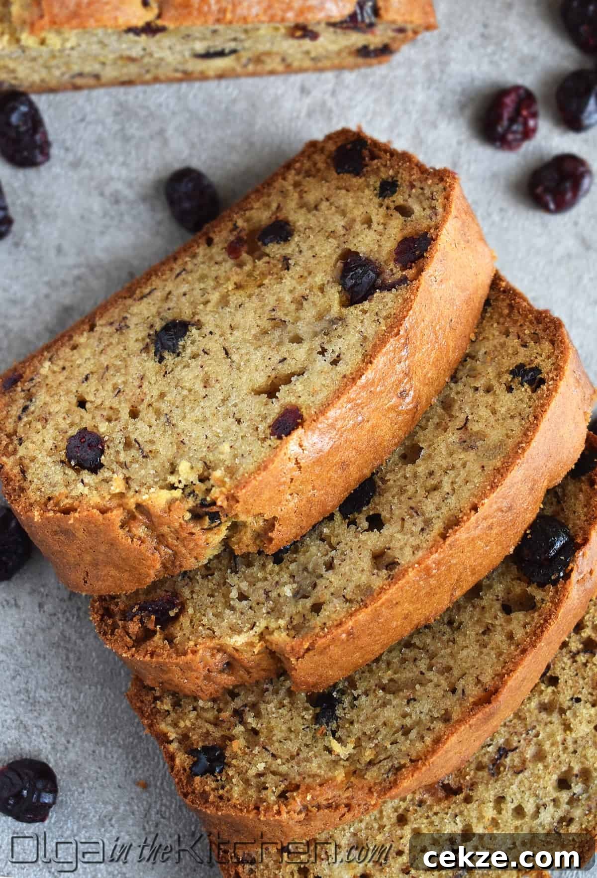 Cranberry Banana Bread is perfectly moist, slightly sweet and loaded with sweet tangy cranberries.