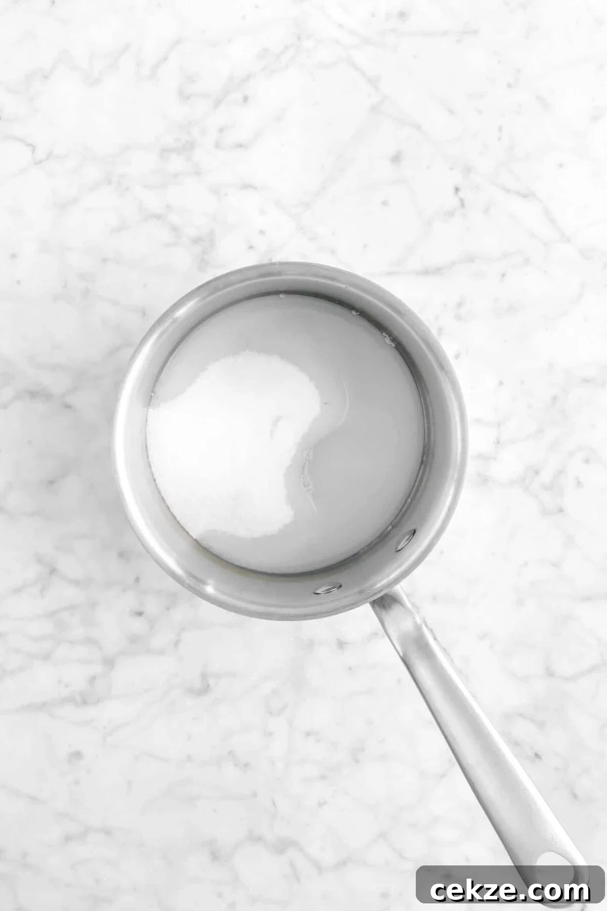 sugar and water in small pot
