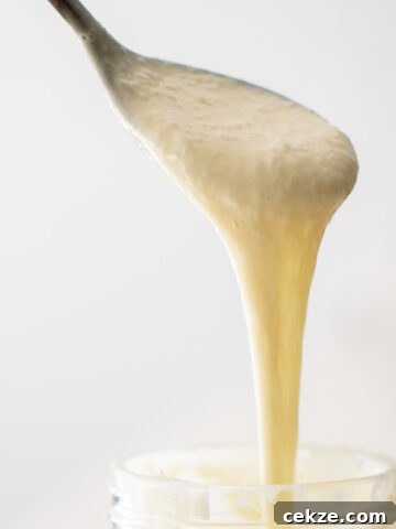 Spoon with sourdough starter.