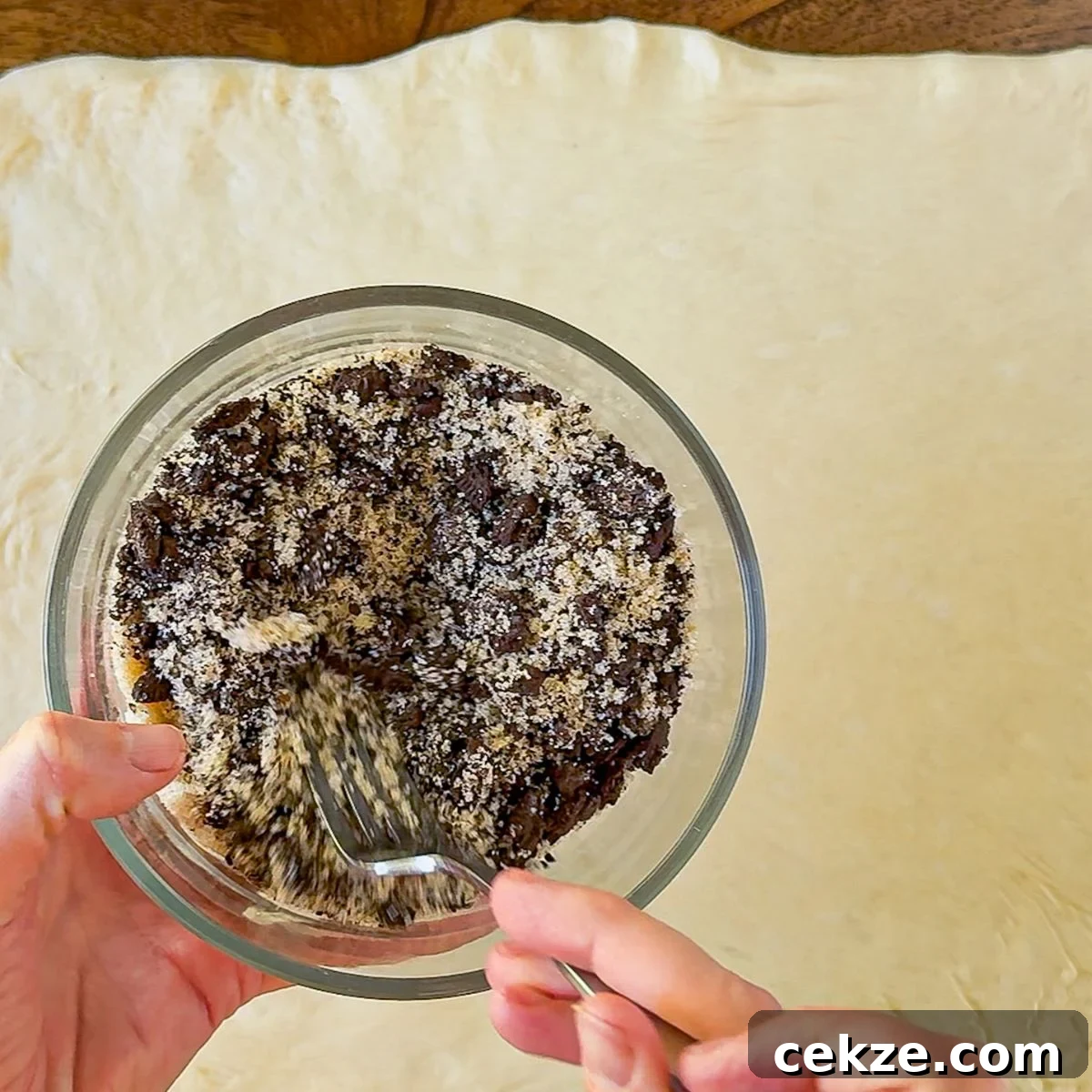 Mixing the Oreo roll filling.