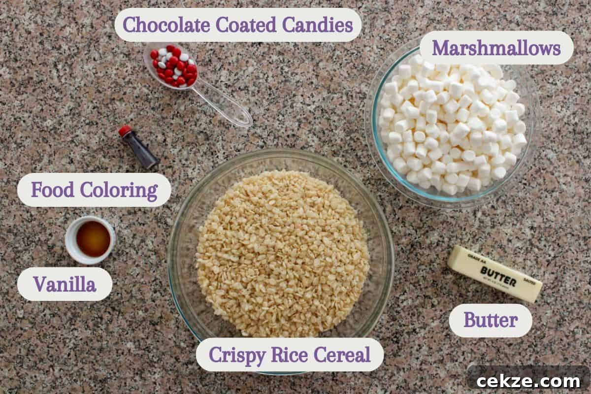 Valentine Rice Krispie Treats: Simple Heart-Shaped Dessert Recipe 3 Ingredients for a sweet treat are laid out on a countertop: chocolate coated candies, marshmallows, food coloring, vanilla, crispy rice cereal, and a stick of butter. Each item is labeled with text.