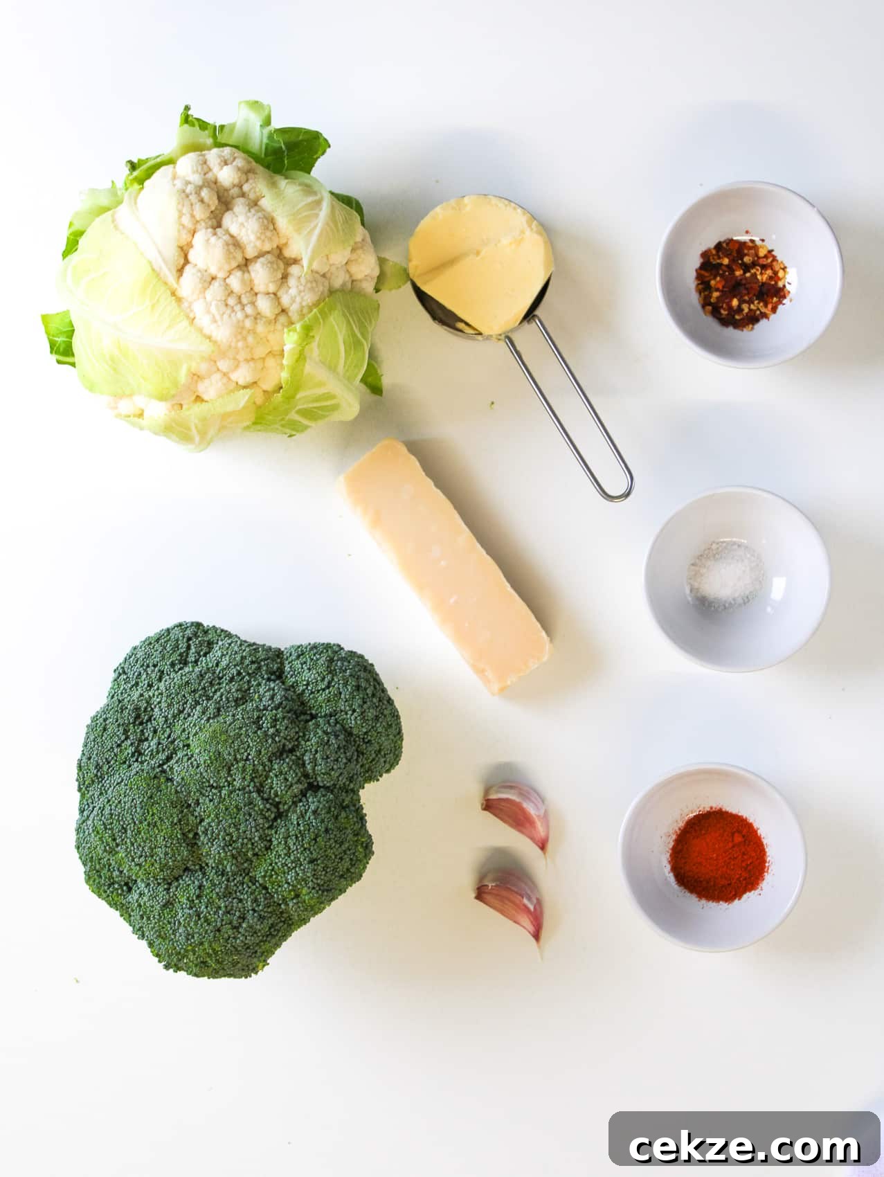 ingredients for air fried broccoli and cauliflower on white background