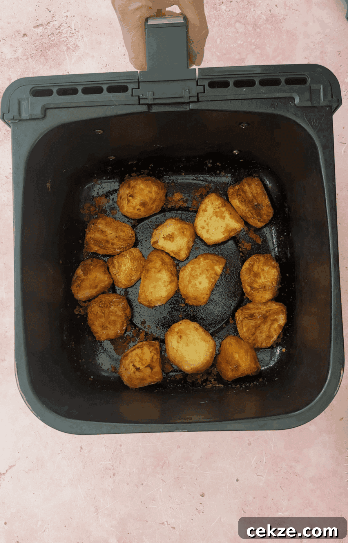 Crispy Air Fryer Roast Potatoes Recipe 7 Air fry the potatoes until crispy and golden.