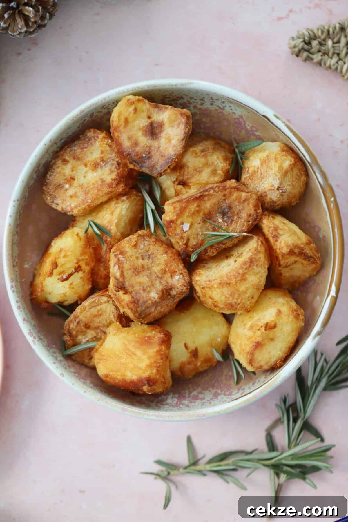 Crispy Air Fryer Roast Potatoes Recipe 8 A bowl of air fryer roast potatoes.