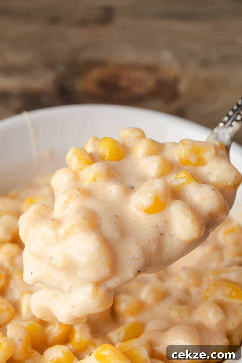 17 Slow Cooker Dinner Recipes That Make Weeknights Simple 12 Cheesy Corn with Cream Cheese and Cheddar