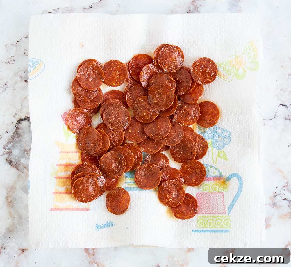 keto pepperoni chips on a paper towel with grease