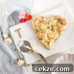 heart-shaped pizza with apple and thyme
