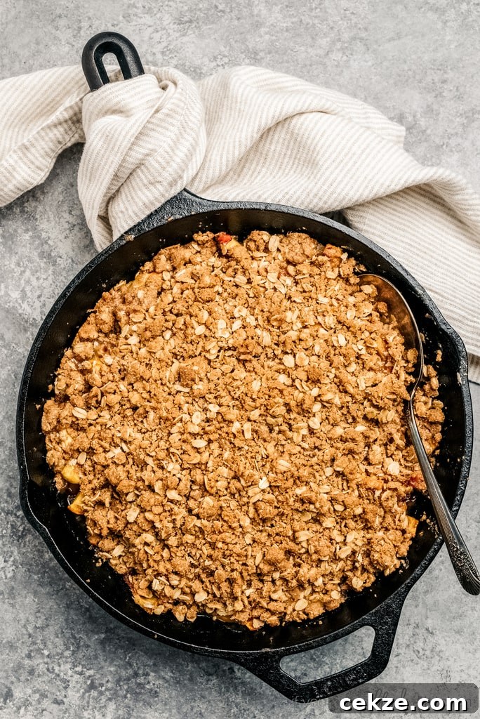 Perfect Peach Crisp Recipe for Summer Desserts 3 peach crisp in cast iron skillet