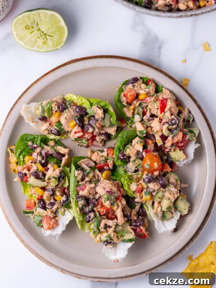 five lettuce cups filled with Mexican tuna salad recipe on a plate