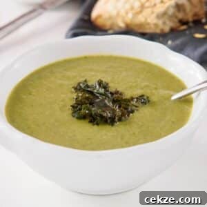 Bowl of cauliflower, kale and leek soup.