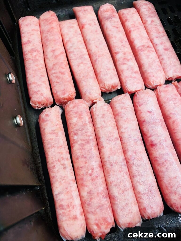 Crispy Sausage Pancake Corn Dogs Recipe 3 sausage links in air fryer before cooking