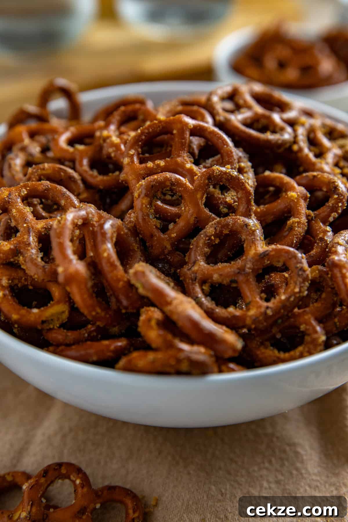 Cracked Pretzel Snack Recipe: Sweet-Salty Caramel Pretzels 2 Seasoned pretzels in a white serving bowl.
