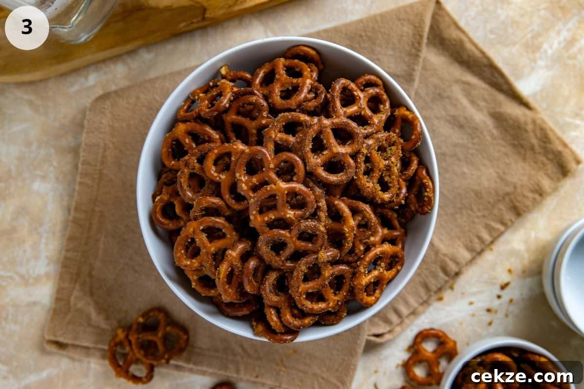 Cracked Pretzel Snack Recipe: Sweet-Salty Caramel Pretzels 6 Seasoned pretzels and a white serving bowl.