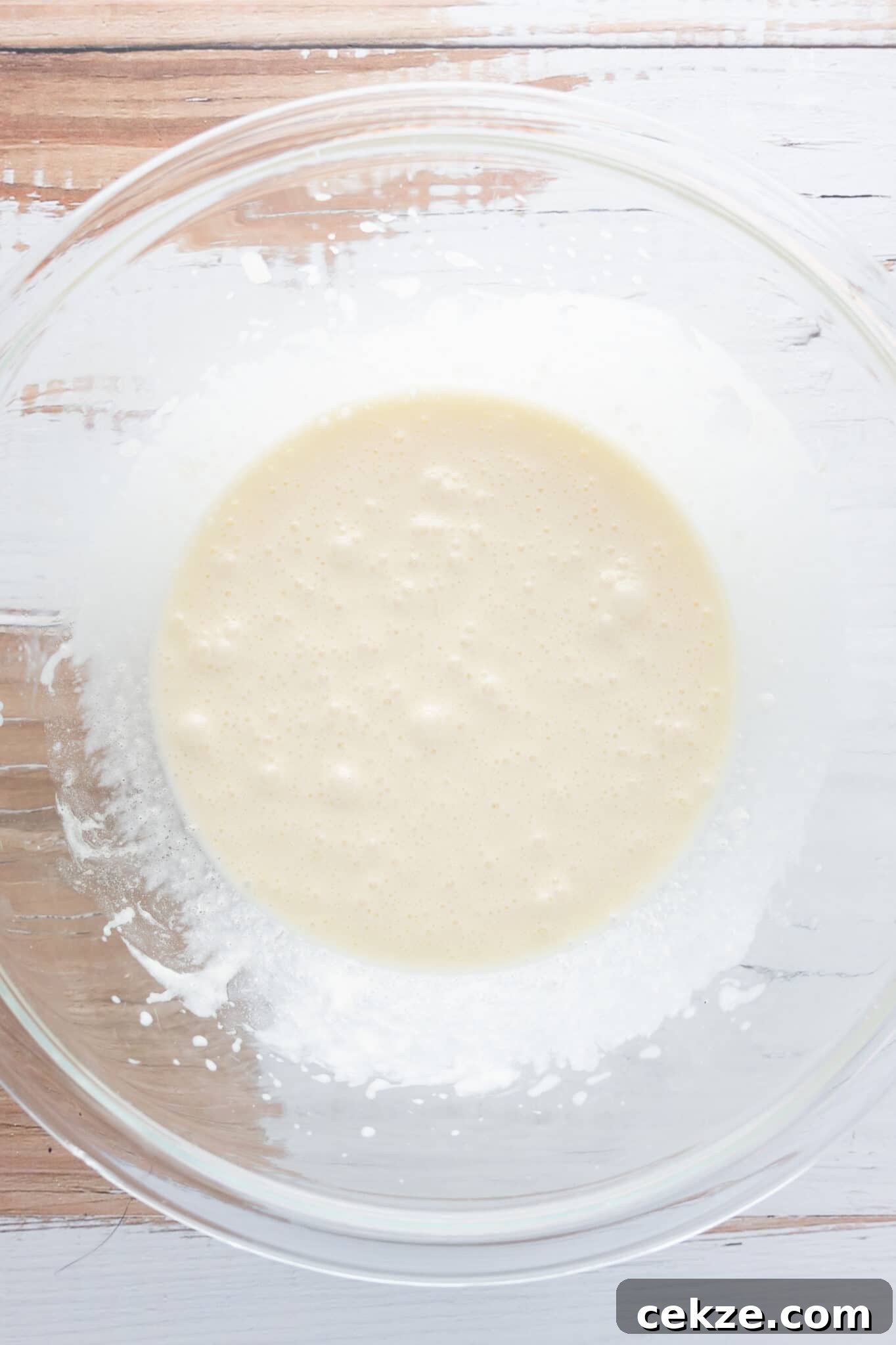 A bowl filled with frothy keto donut batter