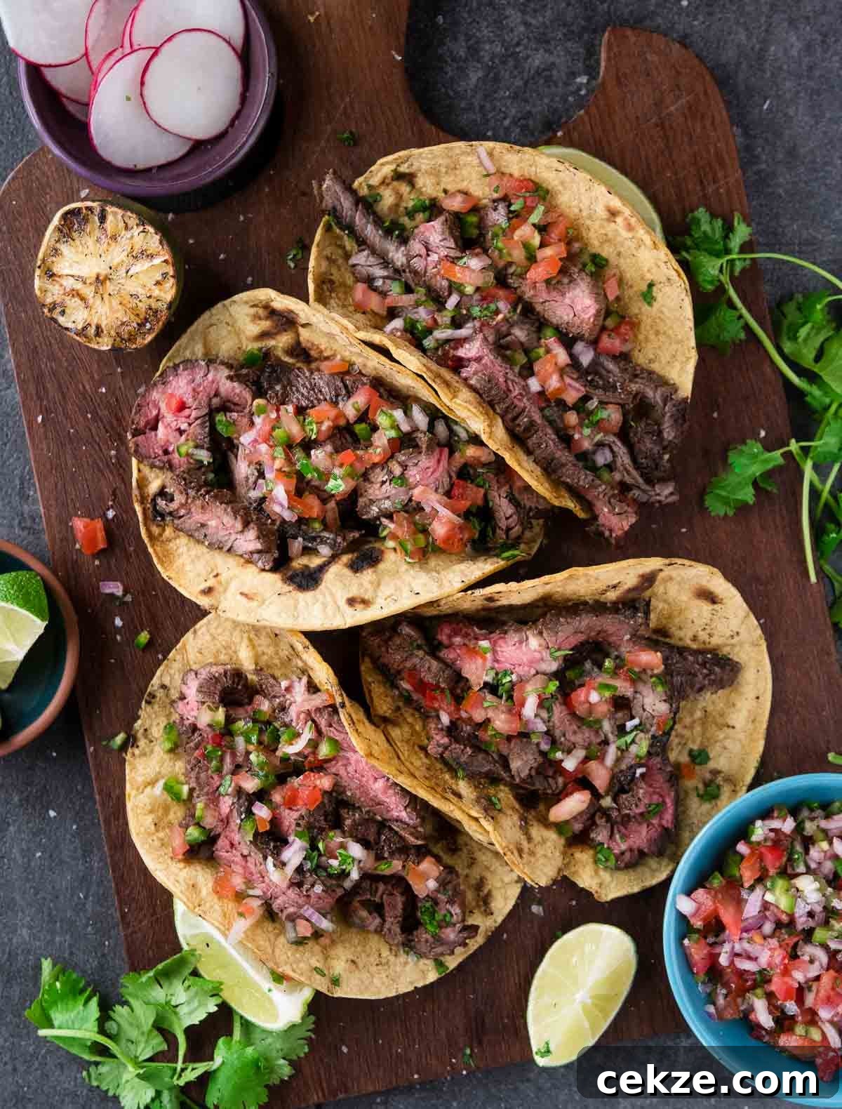 Carne Asada Skirt Steak Tacos with Citrus Garlic Marinade 2 Carne Asada Skirt Steak Tacos on a platter.