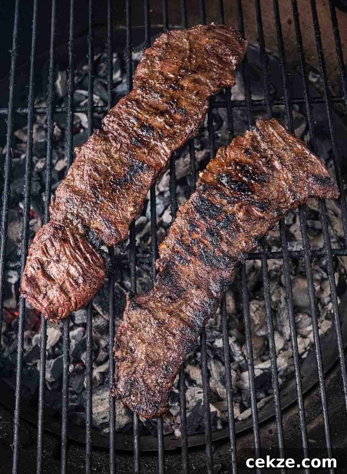 Carne Asada Skirt Steak Tacos with Citrus Garlic Marinade 5 Skirt Steak cooking on the grill.