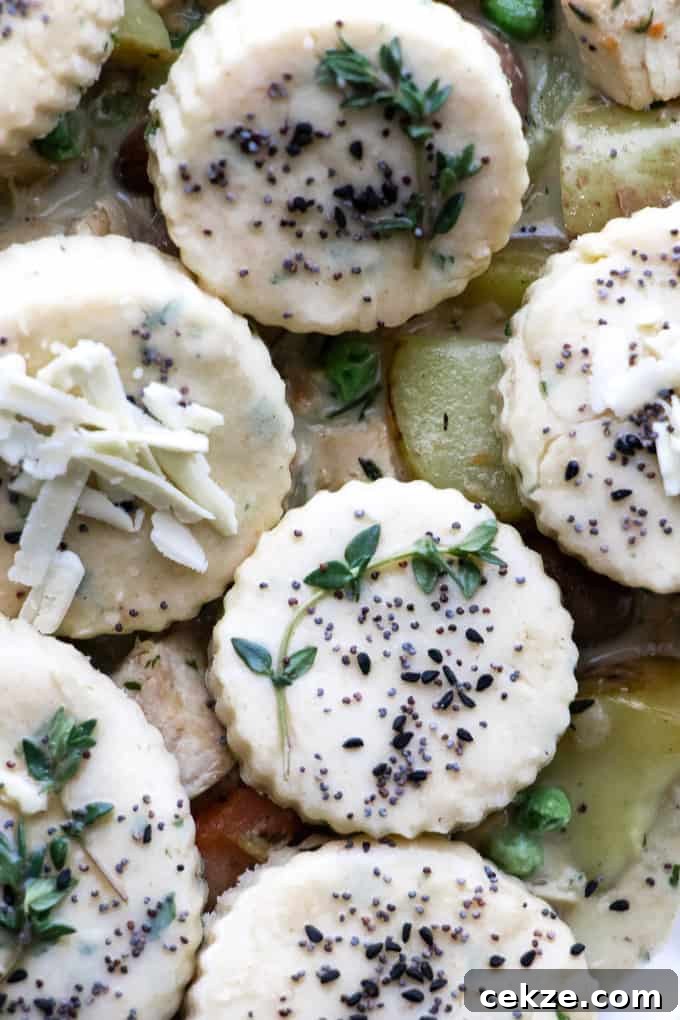 This turkey and mushroom pie with herb biscuit topping is the cosiest way to use up leftover turkey. The simple biscuit topping elevates this pie to a luxurious dinner. Perfect for cosy and casual entertaining.