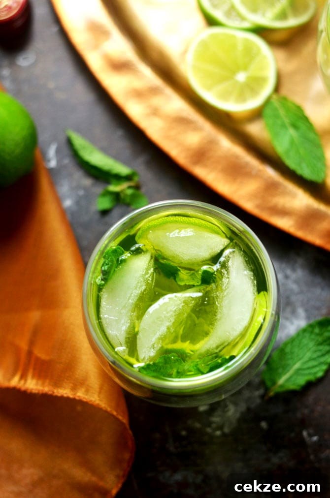 Melon Whiskey Ginger. This simple cocktail features midori melon liqueur, Jameson whiskey, ginger ale, lime wheels, and fresh mint. It's perfect for St. Patrick's Day, and delicious enough to become a go-to summer drink as well! | hostthetoast.com