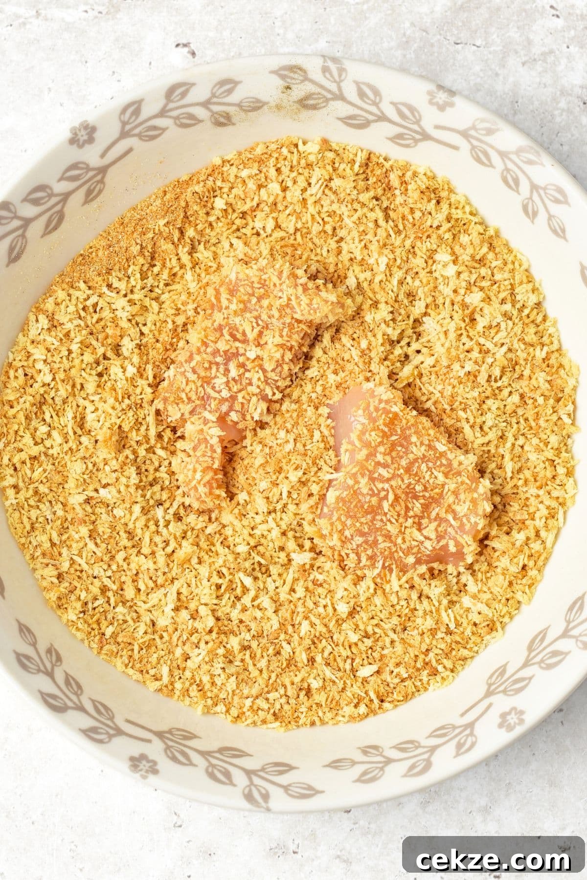 Homemade Turkey Nugget Recipe Coating turkey pieces in breadcrumbs