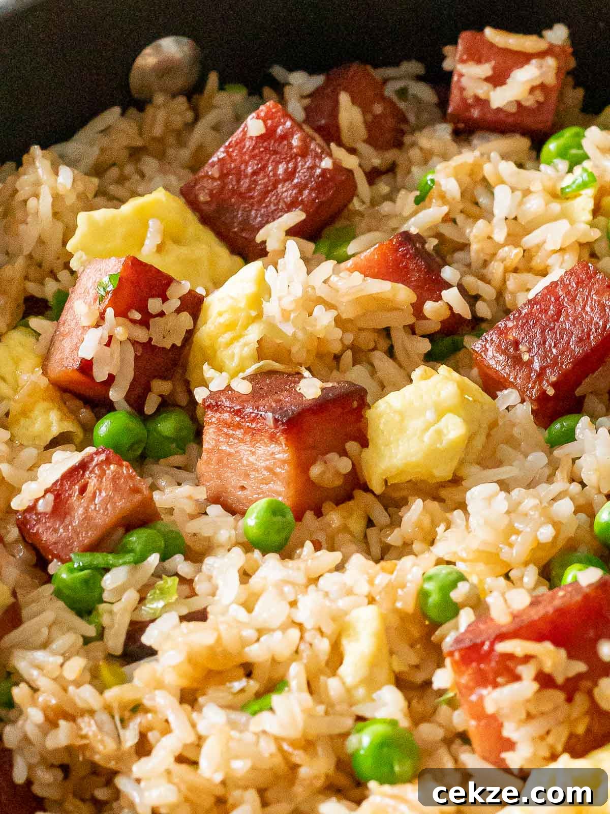 crispy spam fried rice with eggs and peas