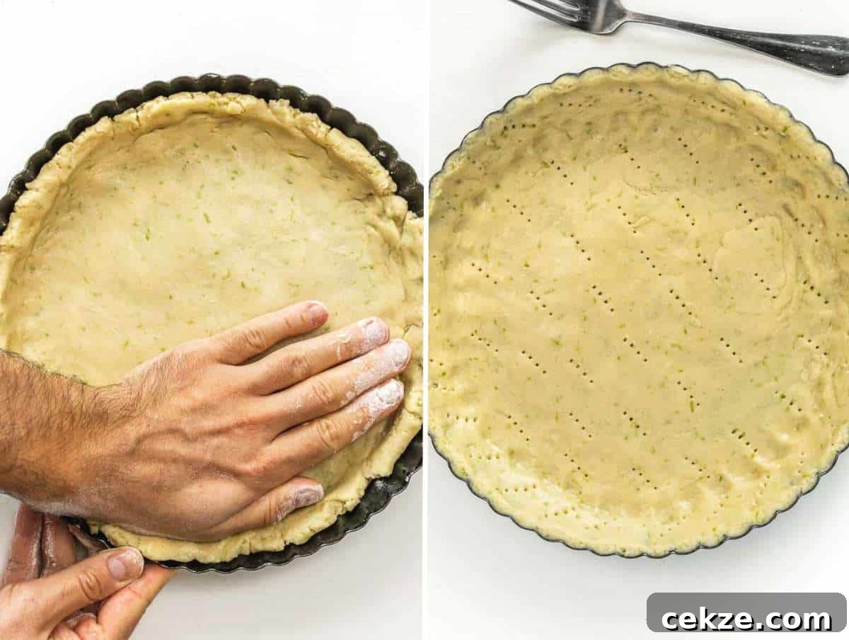 Shaping the crust in the tart pan.