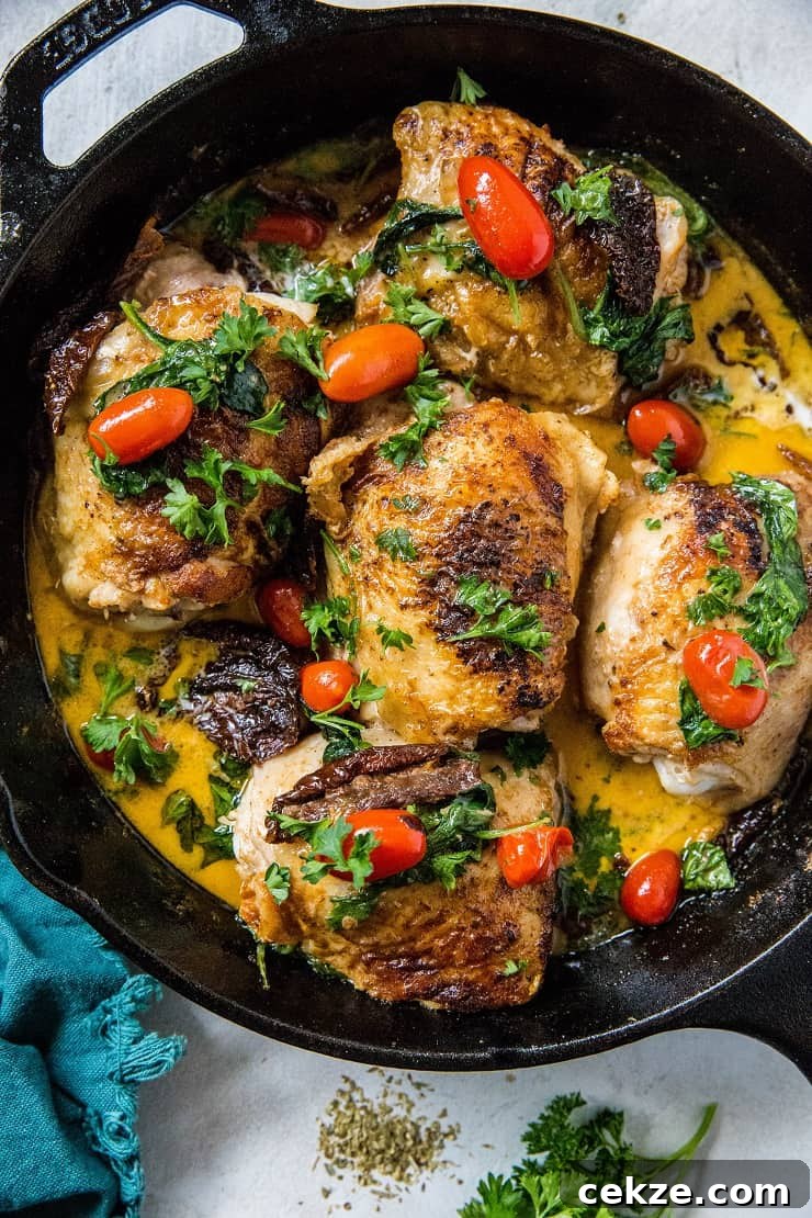 Top Chicken Thigh Recipes for Flavorful Weeknight Dinners 26 One-Skillet Creamy Tuscan Chicken - paleo, whole30, keto, healthy clean dinner recipe made in just one pot or skillet | TheRoastedRoot.net