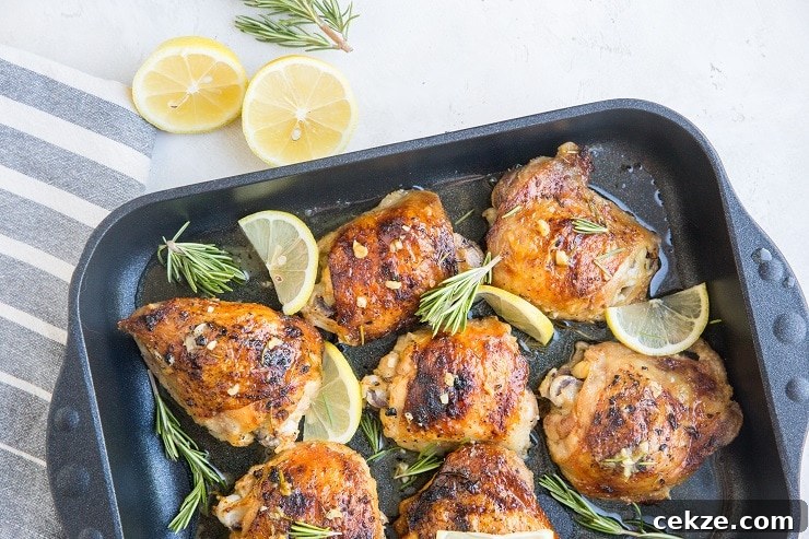 Top Chicken Thigh Recipes for Flavorful Weeknight Dinners 4 Lemon Garlic Rosemary Baked Chicken Recipe - deliciously zesty and herby baked chicken thighs are fall-off-the-bone delicious!