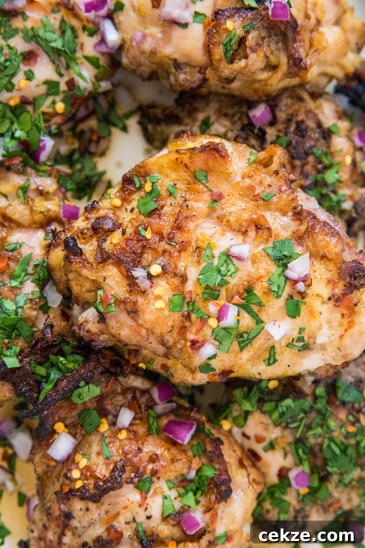 Top Chicken Thigh Recipes for Flavorful Weeknight Dinners 33 Orange Ginger Marinated Grilled Chicken - Orange-ginger marinade is amazing for any animal protein, whether you're baking or grilling it! This easy recipe requires few ingredients and hardly any time. | TheRoastedRoot.net