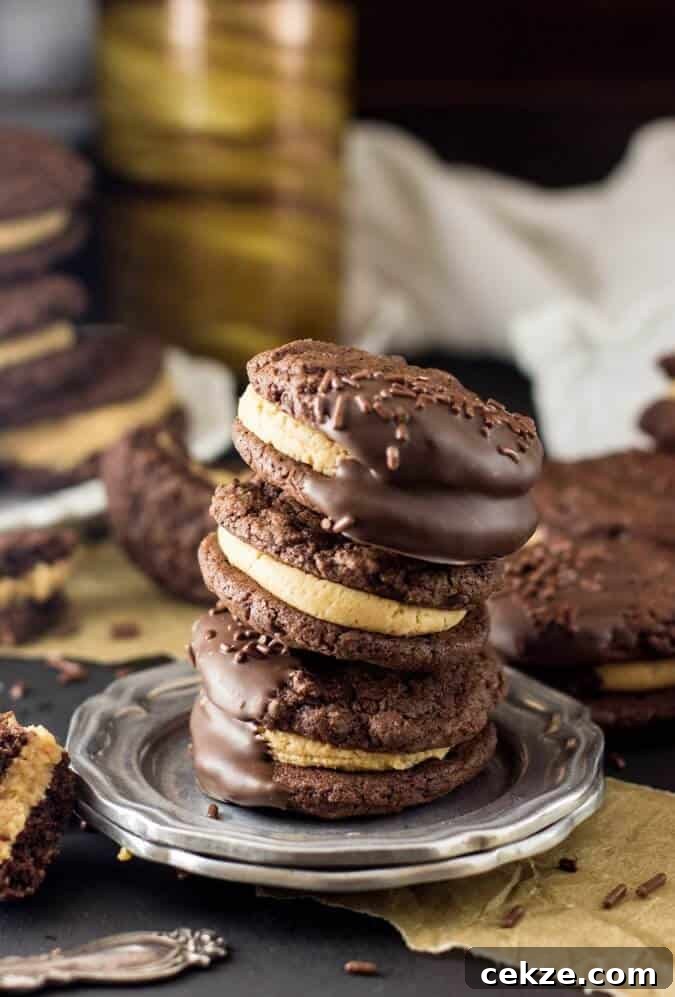 chocolate sandwich sookies stacked on silver plate