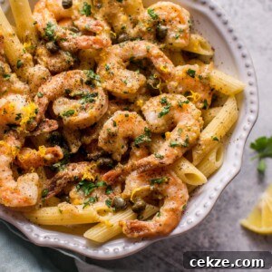 This quick and easy shrimp piccata recipe is ready in under half an hour. Succulent shrimp are cooked in a lemon-butter-caper sauce and served over penne.