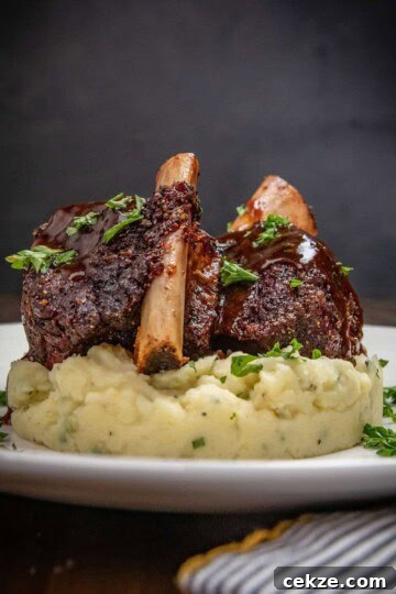 Smoked beef short ribs over mashed potatoes