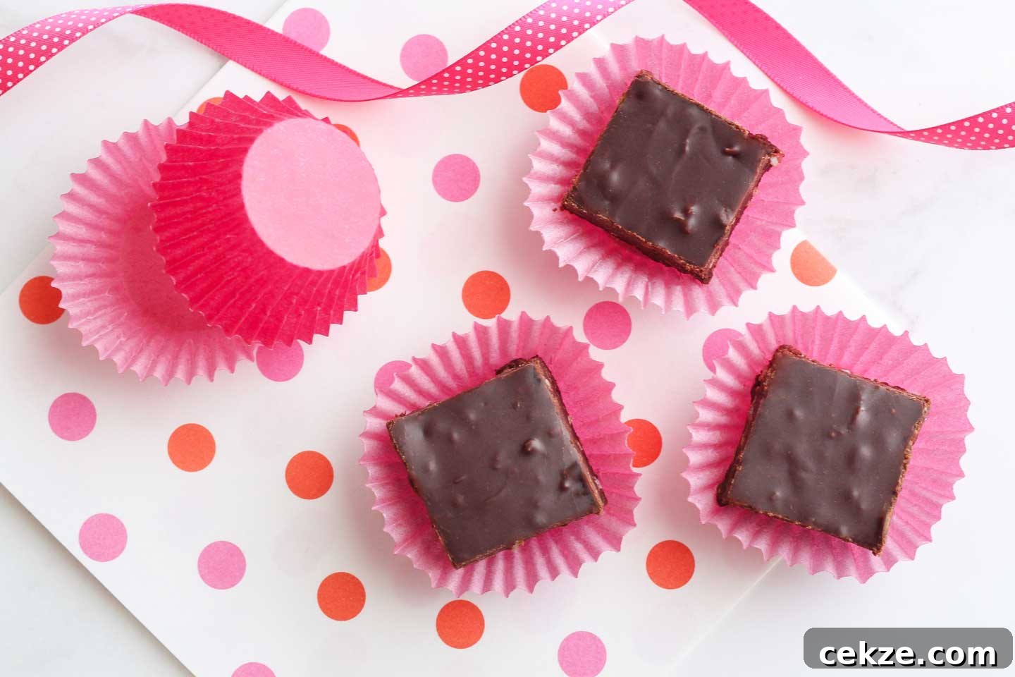 Three squares of fudge on cupcake papers