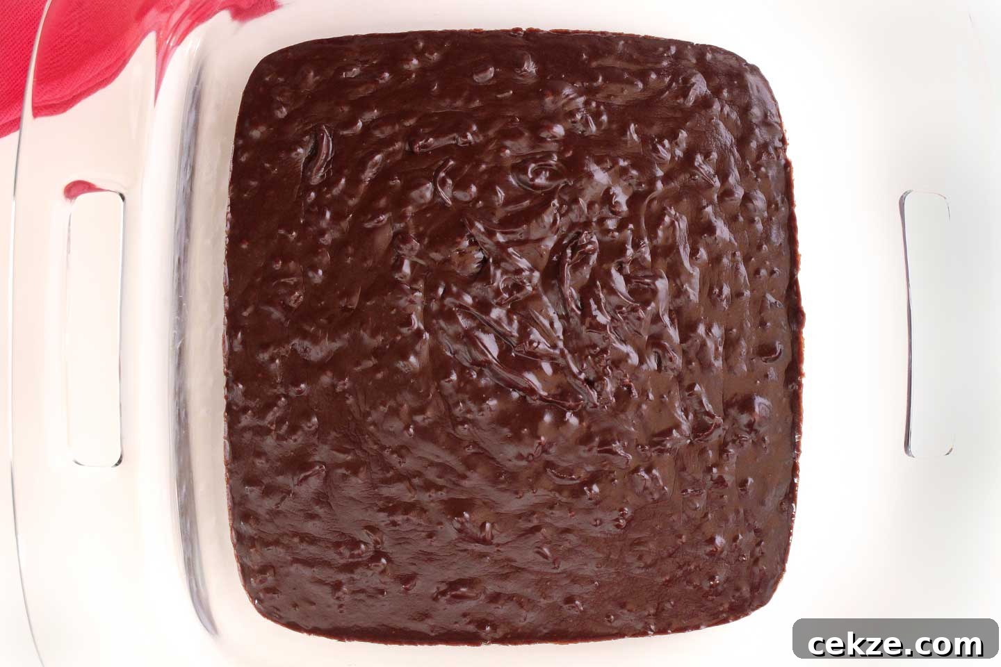 Warm chocolate mixture poured into a pan