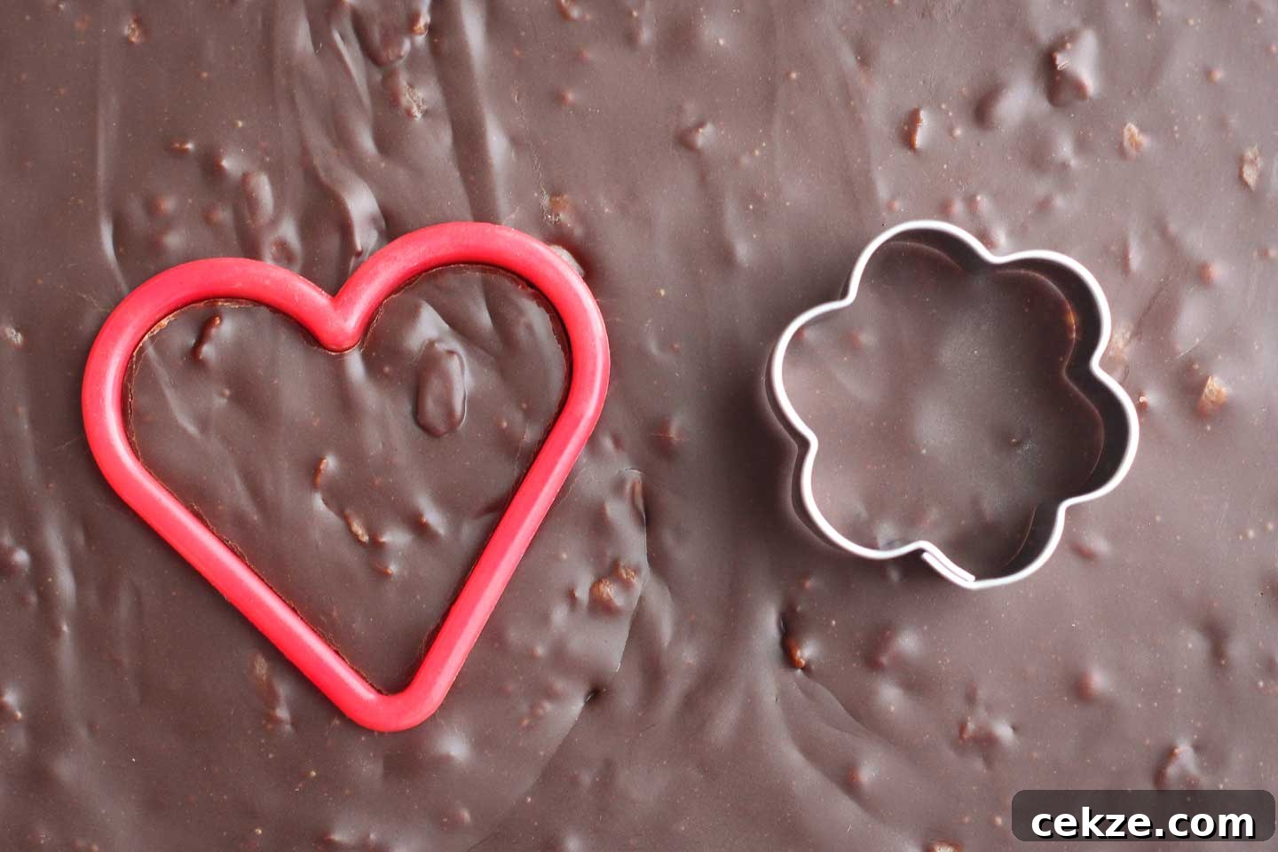 Cookie cutters cutting fudge shapes
