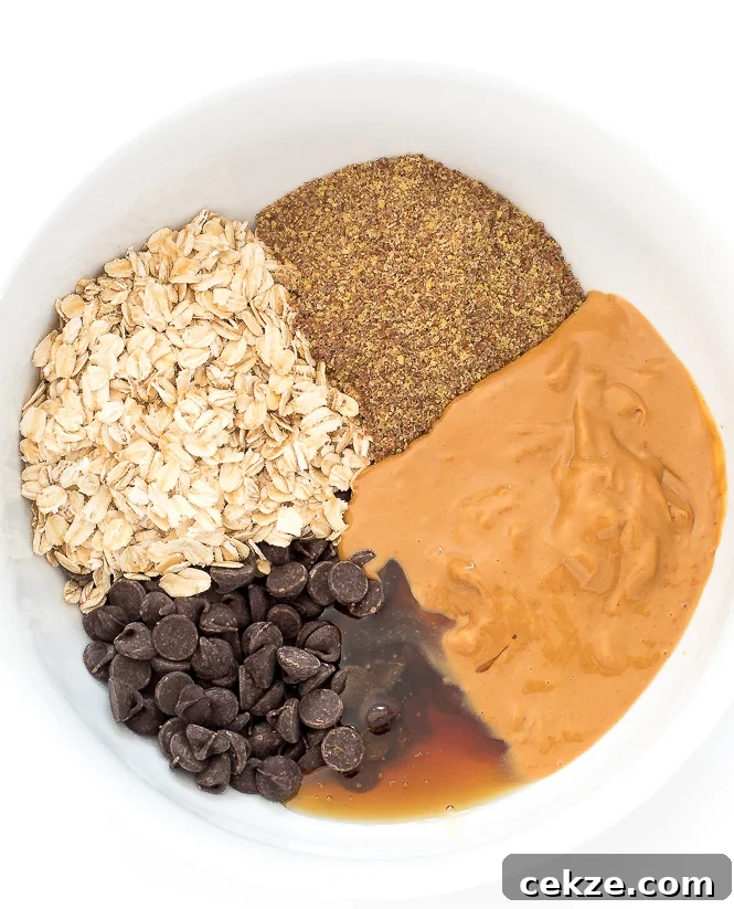 peanut butter protein ball Ingredients in white bowl