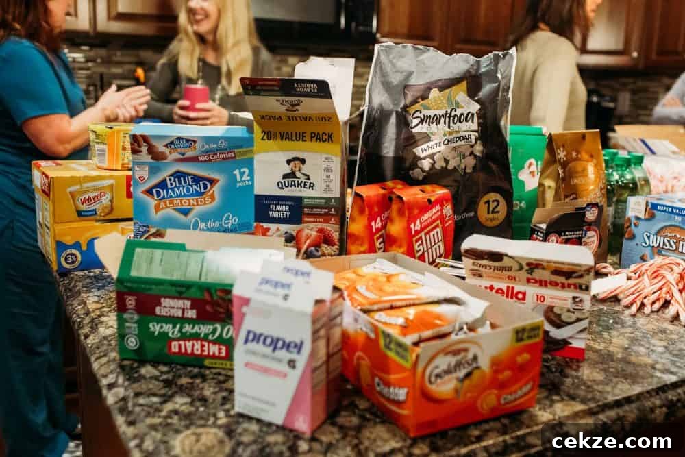 A variety of items to put inside a care package on a kitchen island