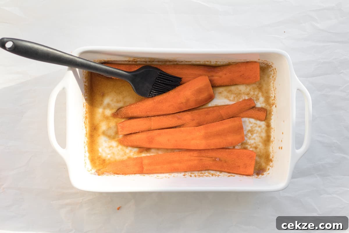 Crispy Bacon-Roasted Carrots with Maple Glaze 6 carrots soaking in a marinade