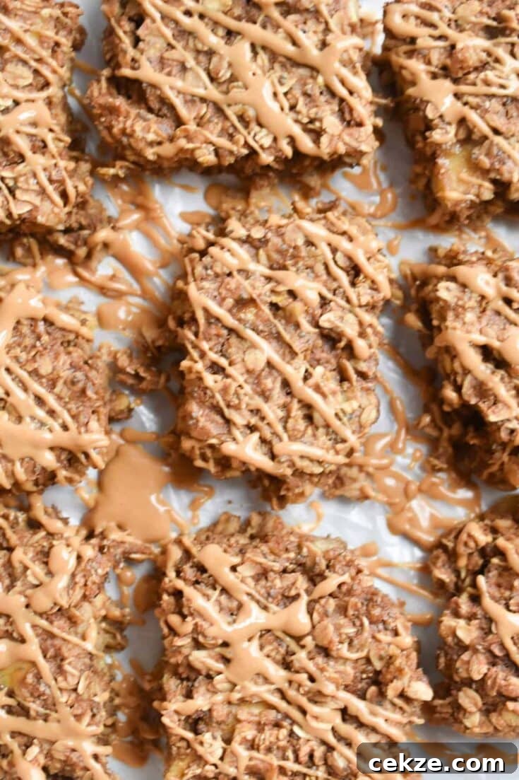Overhead view of peanut butter banana breakfast bars drizzled with glaze.