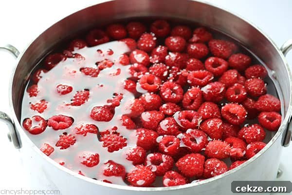 Pouring raspberry iced tea