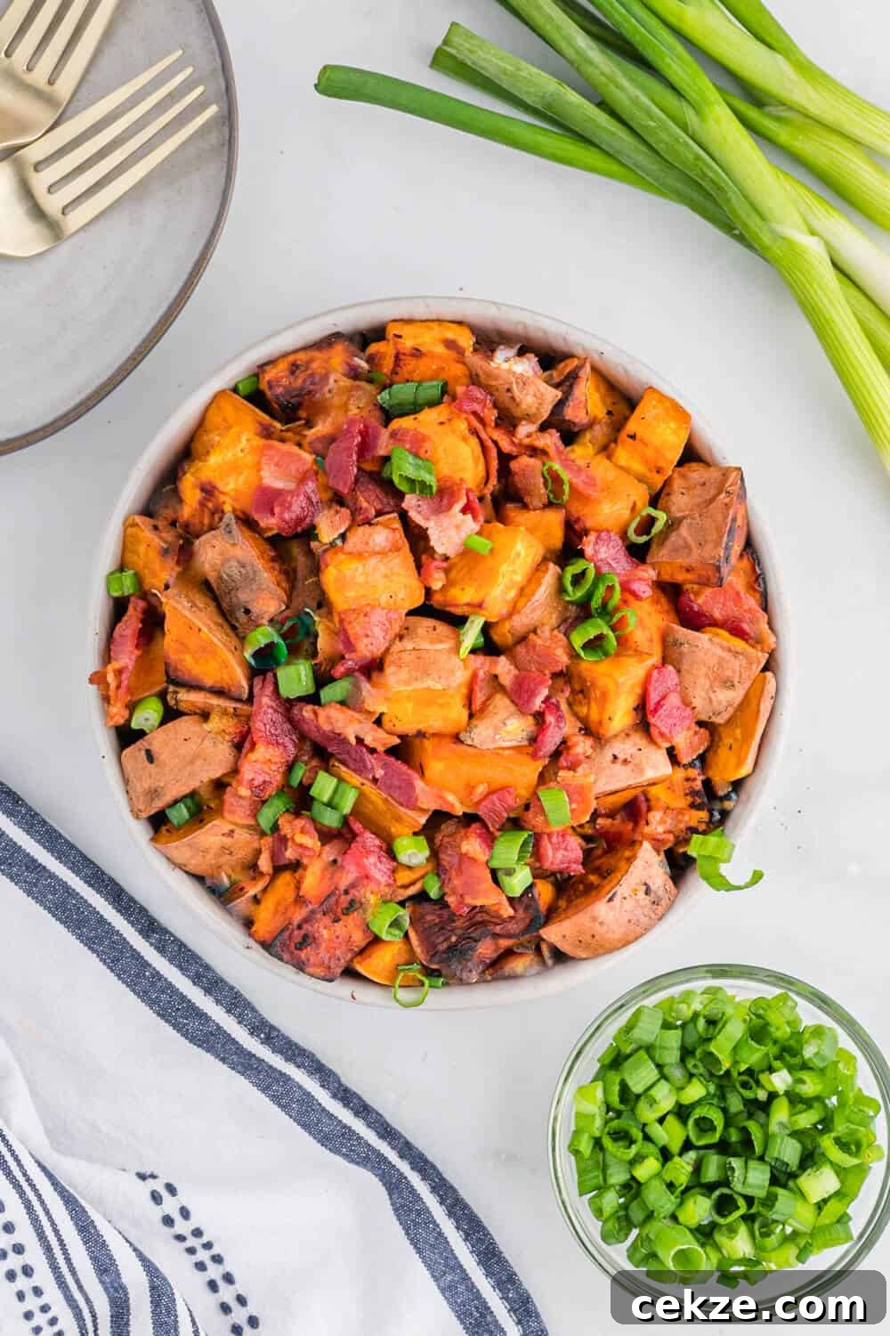 A bowl of sweet potato home fries.