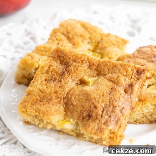 peach blondies recipe close up on a small white plate