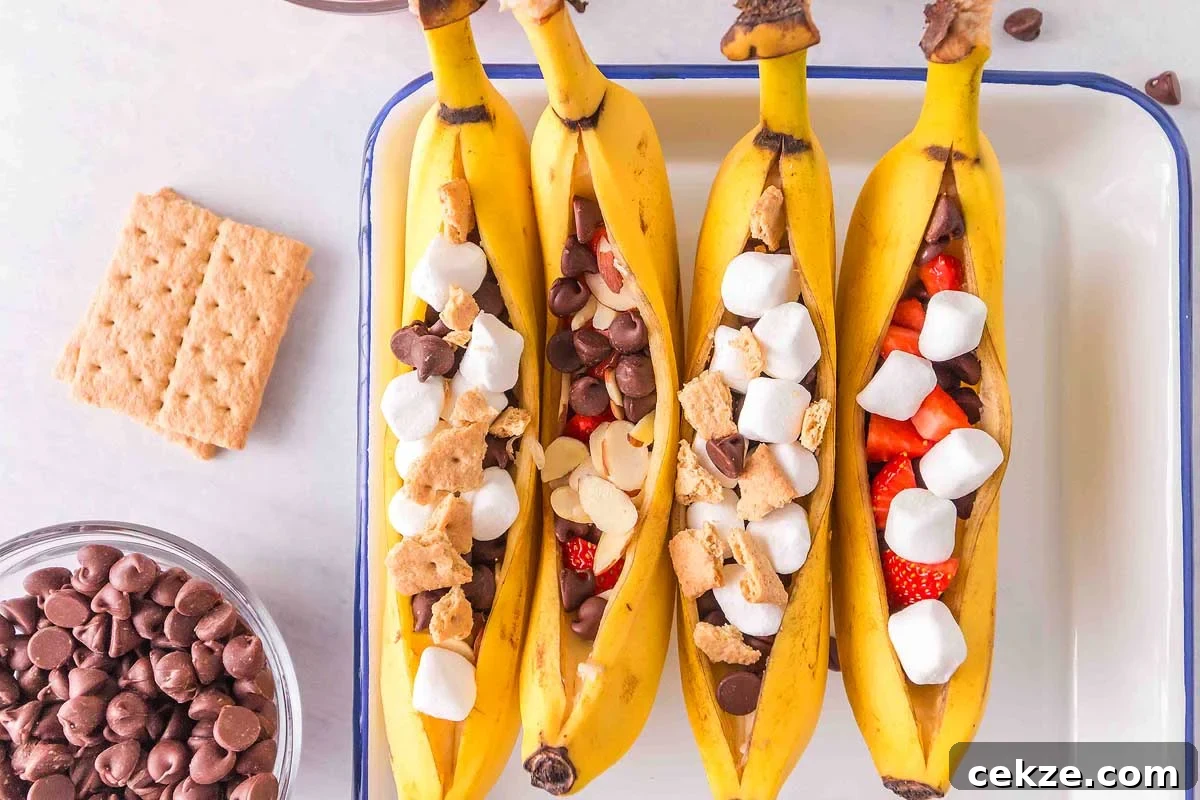 49 TikTok Recipes That Truly Live Up to the Hype 3 Four bananas split open and filled with marshmallows, chocolate chips, strawberries, and graham cracker pieces.