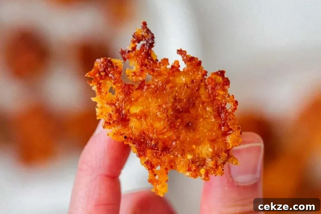 49 TikTok Recipes That Truly Live Up to the Hype 34 Holding a crispy potato.