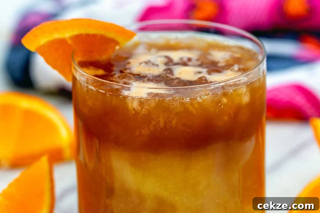 49 TikTok Recipes That Truly Live Up to the Hype 35 Coffee and ornage juice in a glass cup.