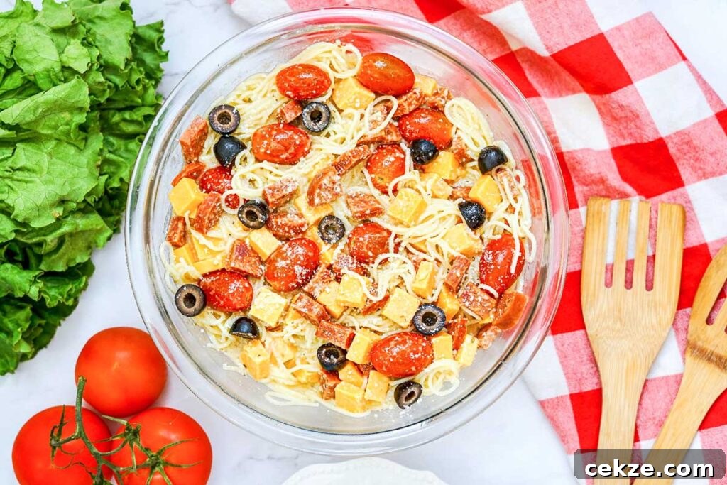 49 TikTok Recipes That Truly Live Up to the Hype 49 a bowl of spaghetti noodles with cheese, pepperoni and olives