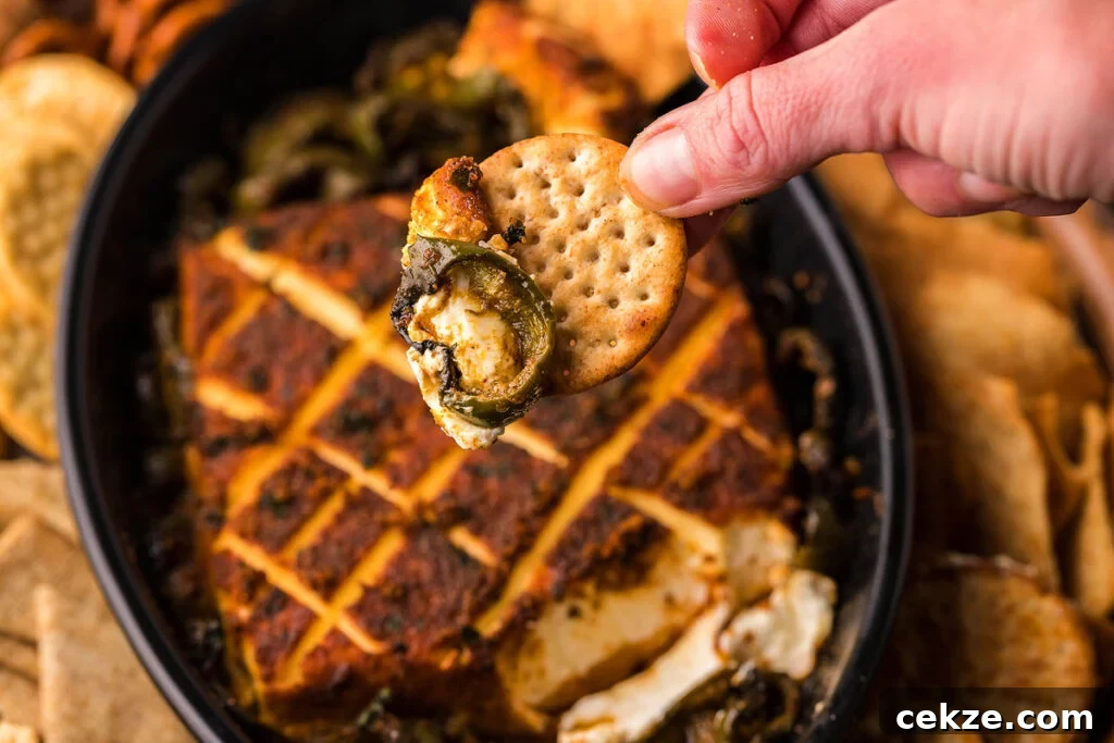 49 TikTok Recipes That Truly Live Up to the Hype 8 Above view of smoked cream cheese in a cast iron pan.