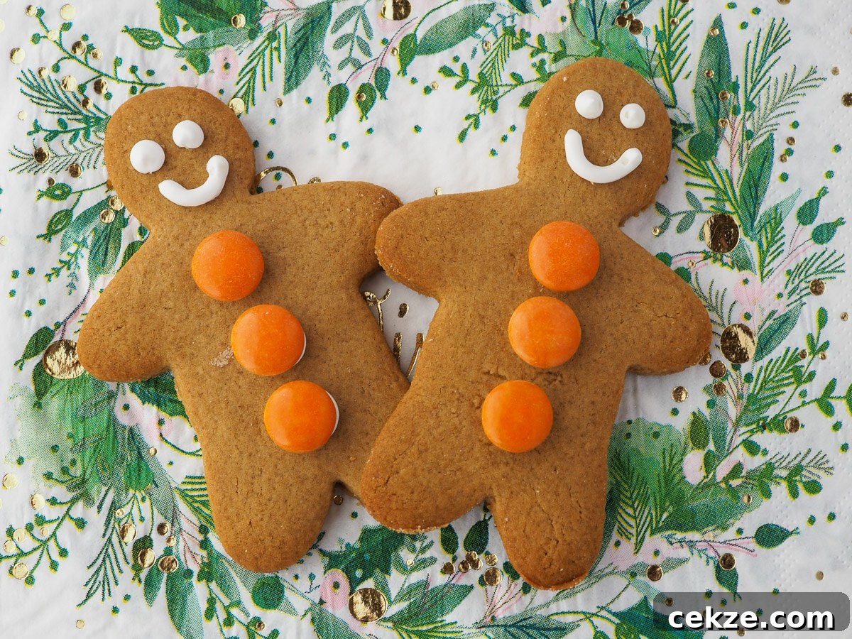 Vegan Gingerbread Recipe: Moist Spiced Loaf for Holidays 11 Pair of gingerbread on a Christmas serviette.